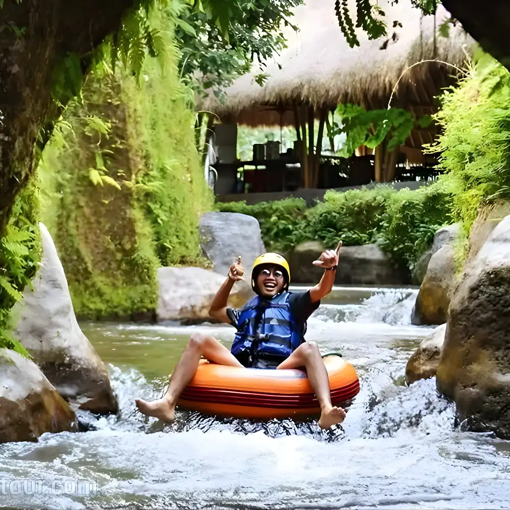 visitor enjoying cave tubing in ubud bali