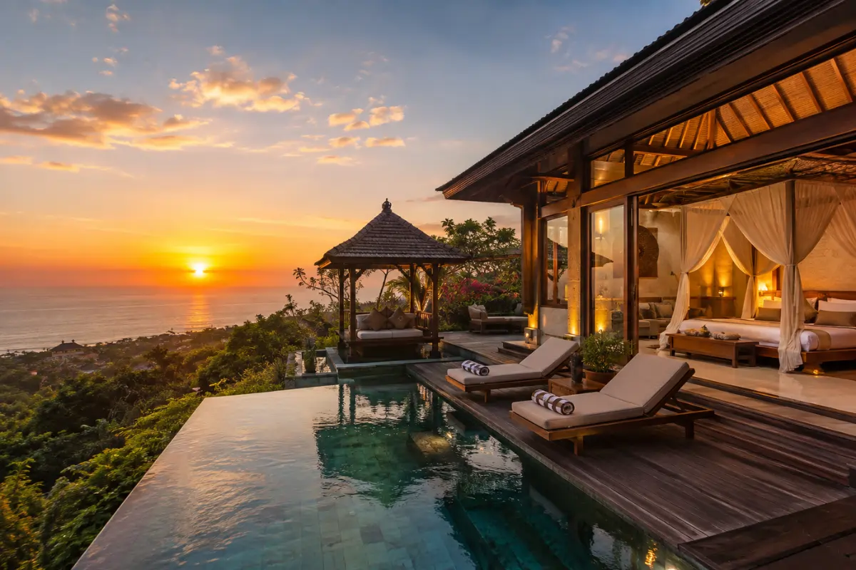 Luxury Bali villa with infinity pool overlooking the ocean during sunset